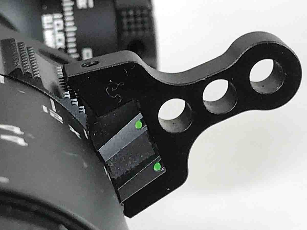 The magnification throw lever has three apertures that can be looked through to bring a target into line  with the reticle.